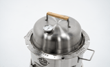 Stainless steel charcoal grill with thermometer and wood handle lid on white background